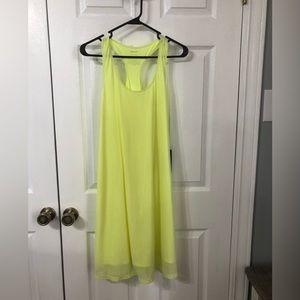 Peach brand Razorback Hinata Dress. Light lime colored size Large.